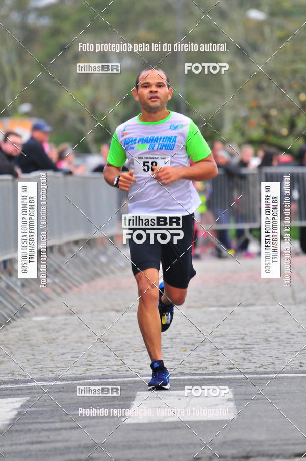 Buy your photos of the event1 Meia Maratona Timb on Fotop
