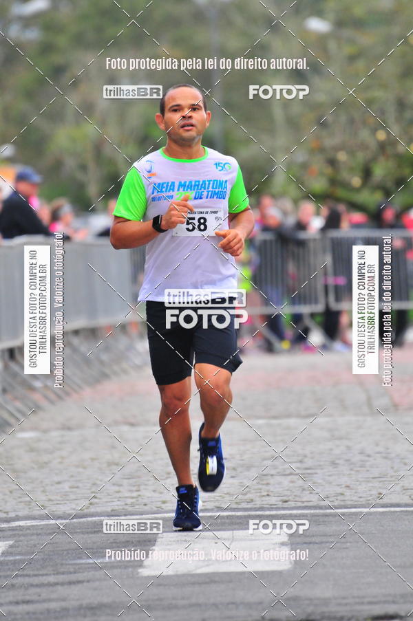 Buy your photos of the event1 Meia Maratona Timb on Fotop