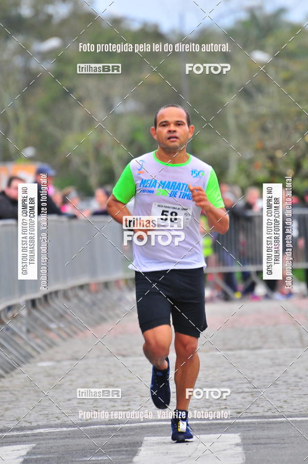 Buy your photos of the event1 Meia Maratona Timb on Fotop