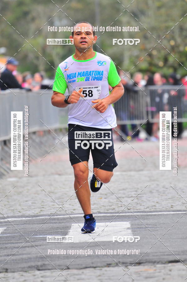 Buy your photos of the event1 Meia Maratona Timb on Fotop