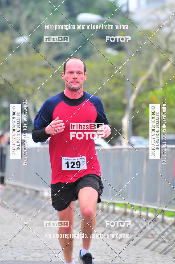 Buy your photos of the event1 Meia Maratona Timb on Fotop