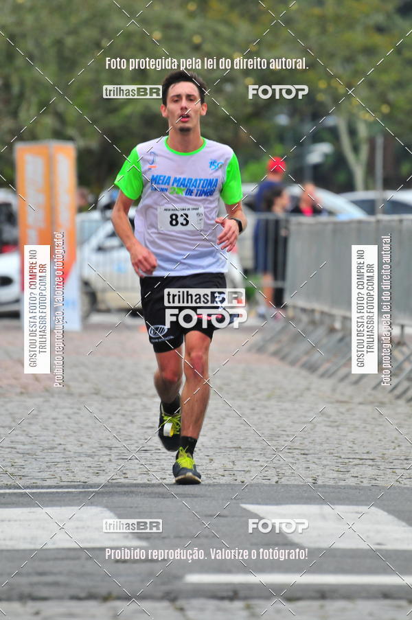 Buy your photos of the event1 Meia Maratona Timb on Fotop