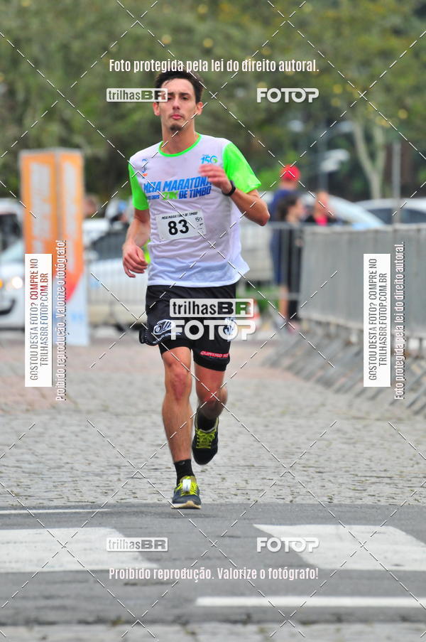 Buy your photos of the event1 Meia Maratona Timb on Fotop