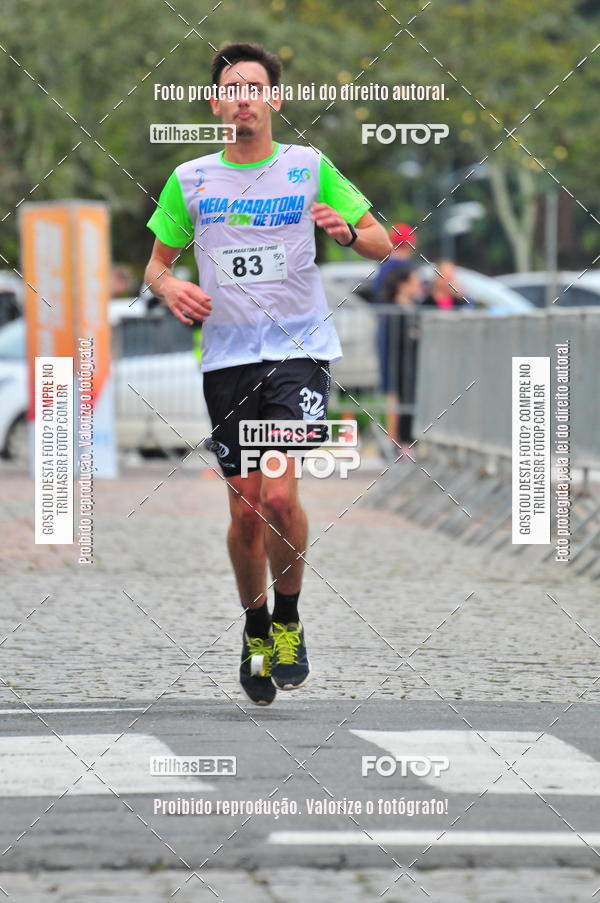 Buy your photos of the event1 Meia Maratona Timb on Fotop