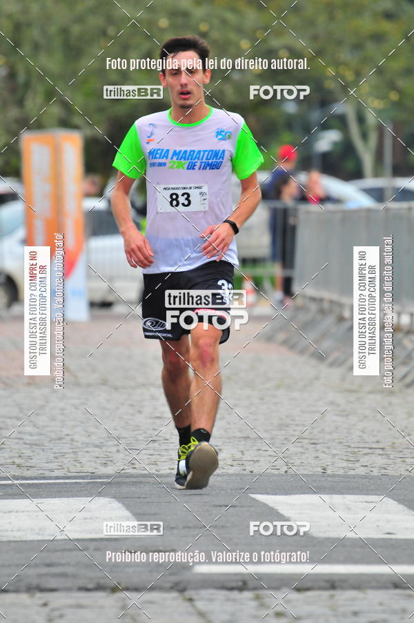 Buy your photos of the event1 Meia Maratona Timb on Fotop