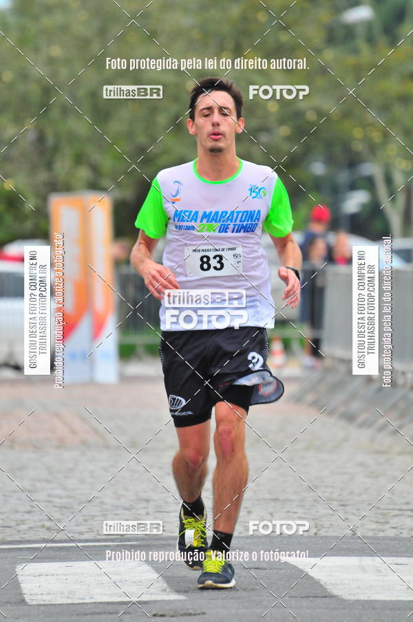 Buy your photos of the event1 Meia Maratona Timb on Fotop