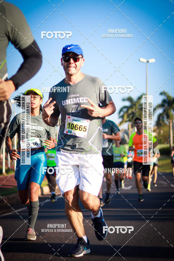 Compra tus fotos del eventoCorrida Unimed En Fotop