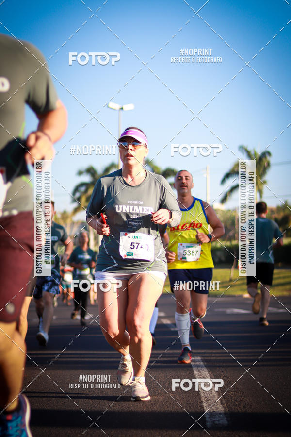 Achetez vos photos de l'�v�nementCorrida Unimed sur Fotop