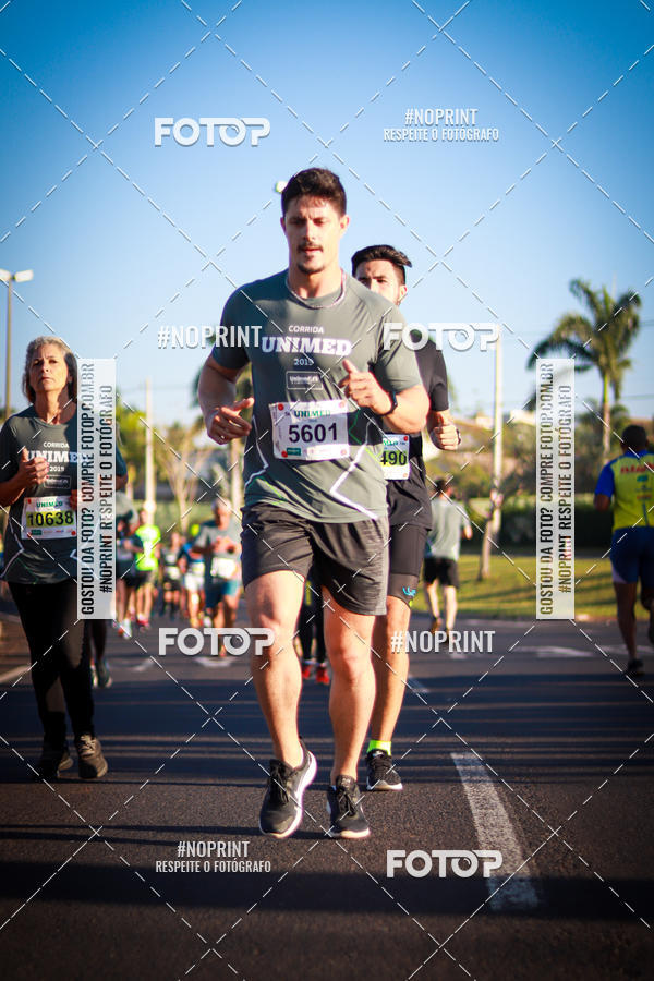 Achetez vos photos de l'�v�nementCorrida Unimed sur Fotop