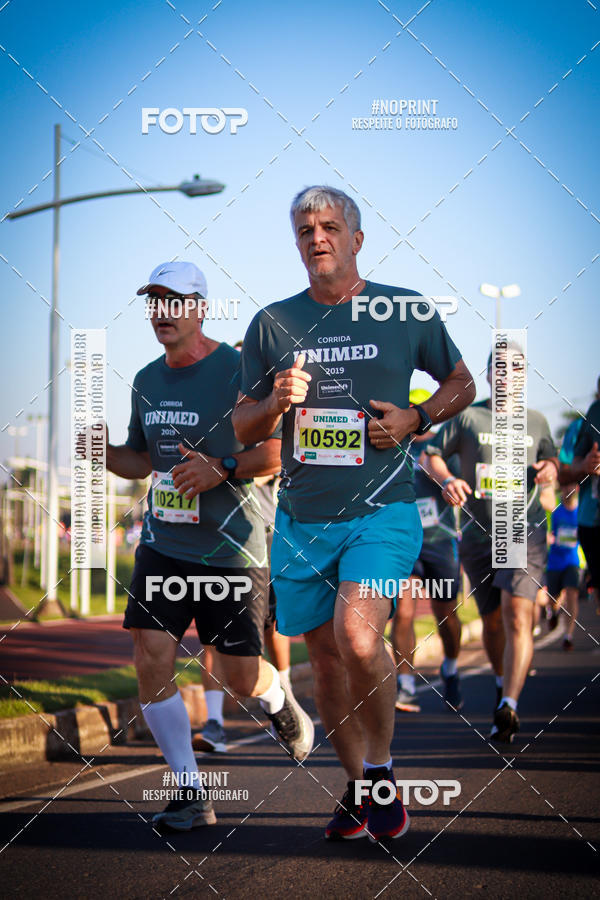 Achetez vos photos de l'�v�nementCorrida Unimed sur Fotop