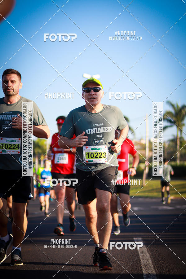 Achetez vos photos de l'�v�nementCorrida Unimed sur Fotop