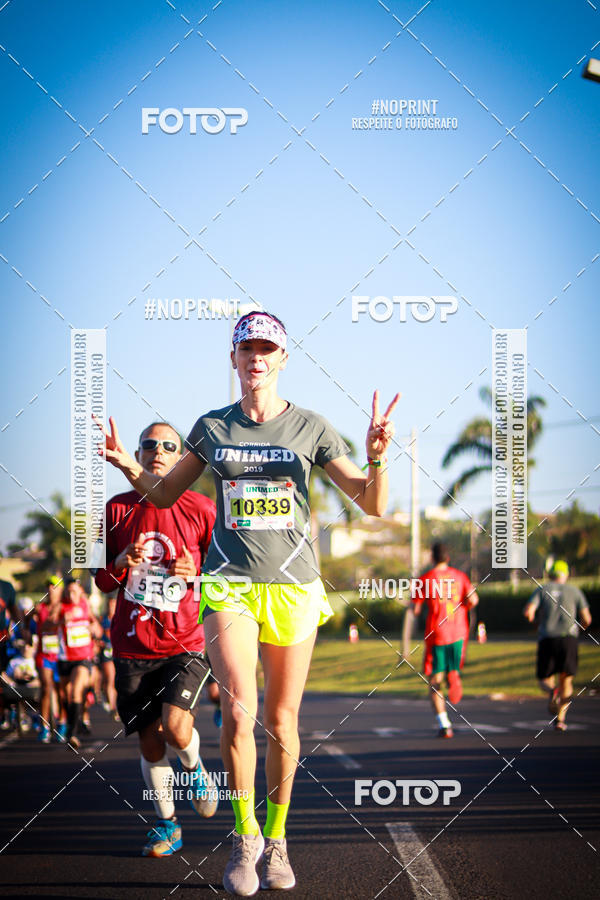 Achetez vos photos de l'�v�nementCorrida Unimed sur Fotop