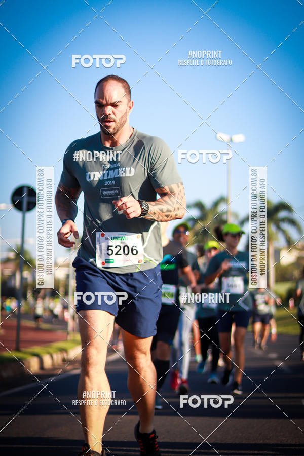 Buy your photos of the eventCorrida Unimed on Fotop