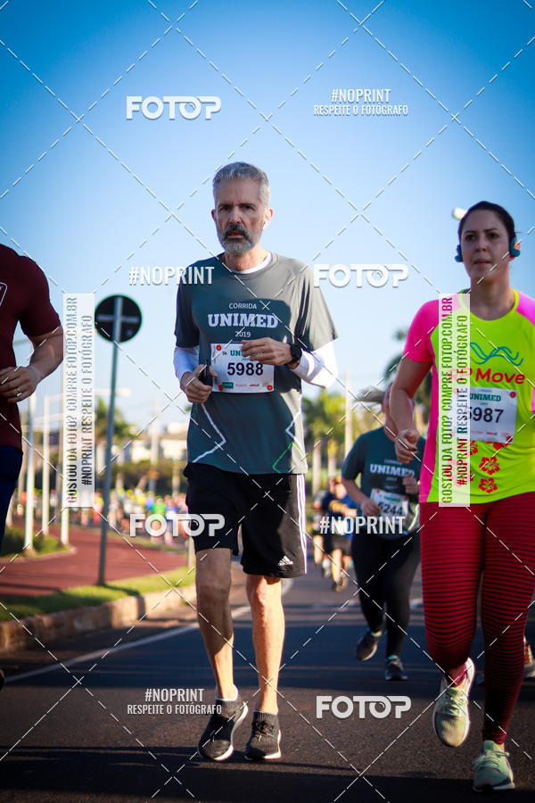 Compre suas fotos do eventoCorrida Unimed no Fotop