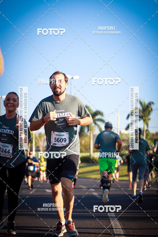 Compre suas fotos do eventoCorrida Unimed no Fotop
