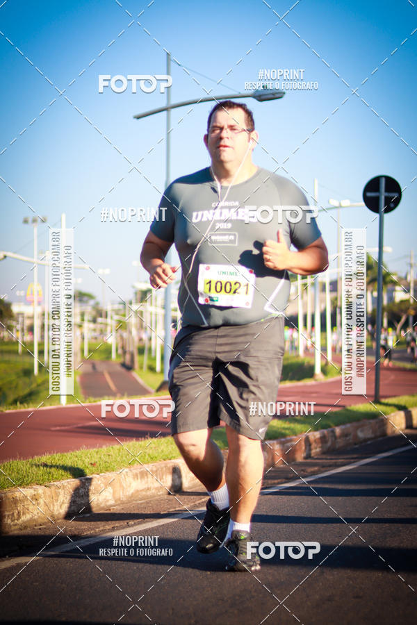 Compre suas fotos do eventoCorrida Unimed no Fotop