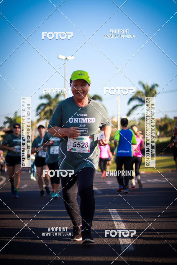 Compre suas fotos do eventoCorrida Unimed no Fotop