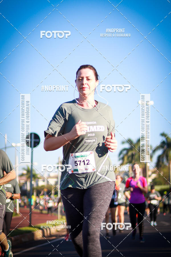 Compre suas fotos do eventoCorrida Unimed no Fotop