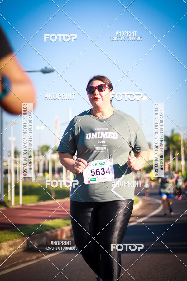 Compra tus fotos del eventoCorrida Unimed En Fotop