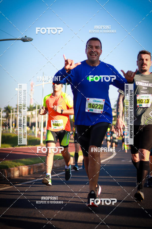 Compra tus fotos del eventoCorrida Unimed En Fotop