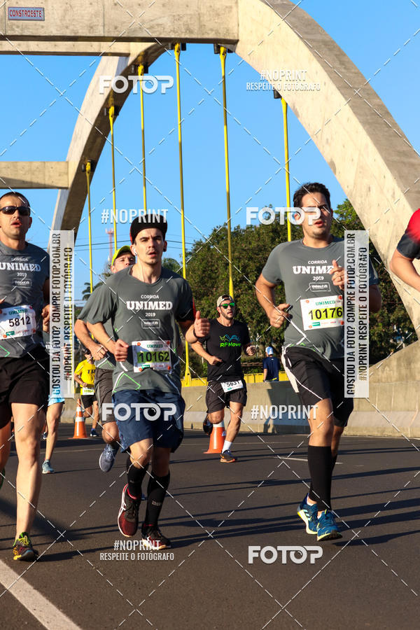 Buy your photos of the eventCorrida Unimed on Fotop