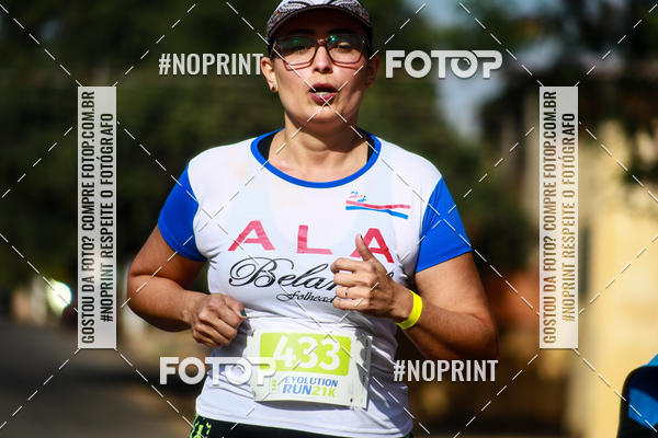 Buy your photos of the eventEvolution Run 21k 2019 on Fotop