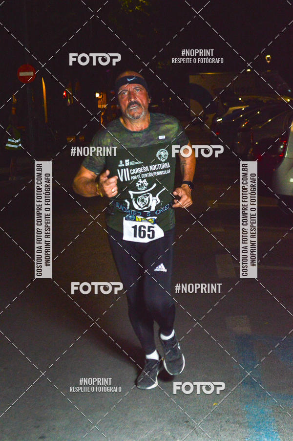 Buy your photos of the eventVII CARRERA NOCTURNA POR EL CENTRO PENINSULAR on Fotop