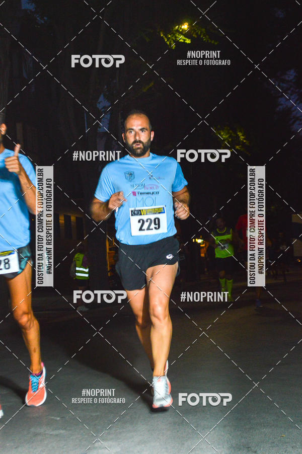 Buy your photos of the eventVII CARRERA NOCTURNA POR EL CENTRO PENINSULAR on Fotop