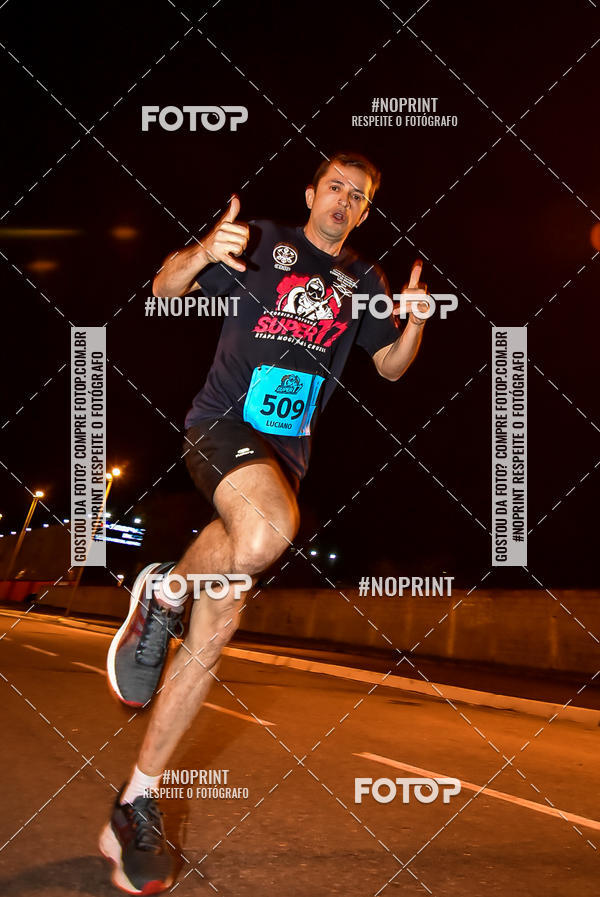 Buy your photos of the event1 Corrida Noturna Super 17 - Etapa Mogi das Cruzes on Fotop