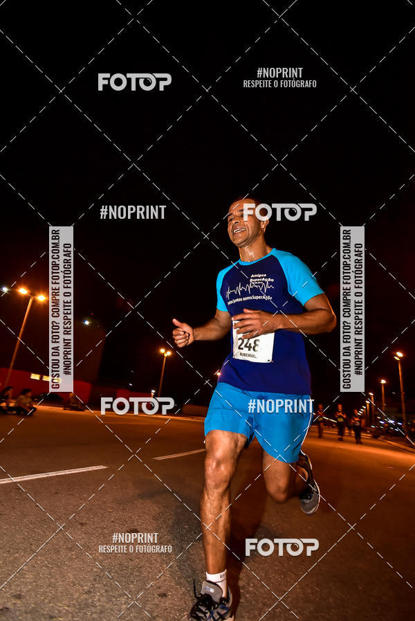 Buy your photos of the event1 Corrida Noturna Super 17 - Etapa Mogi das Cruzes on Fotop
