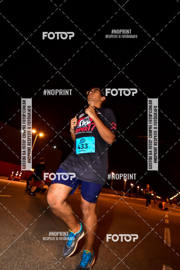 Buy your photos of the event1 Corrida Noturna Super 17 - Etapa Mogi das Cruzes on Fotop