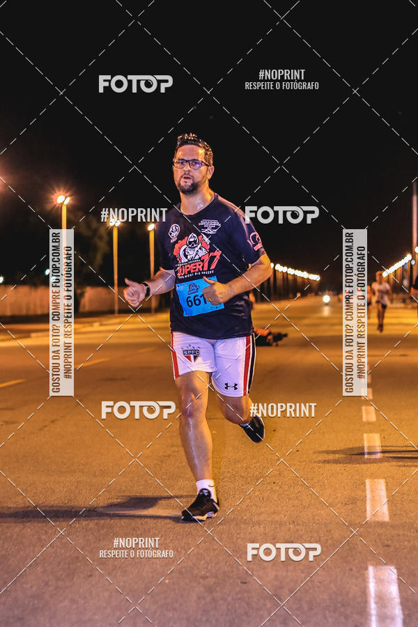 Buy your photos of the event1 Corrida Noturna Super 17 - Etapa Mogi das Cruzes on Fotop