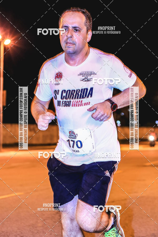 Buy your photos of the event1 Corrida Noturna Super 17 - Etapa Mogi das Cruzes on Fotop