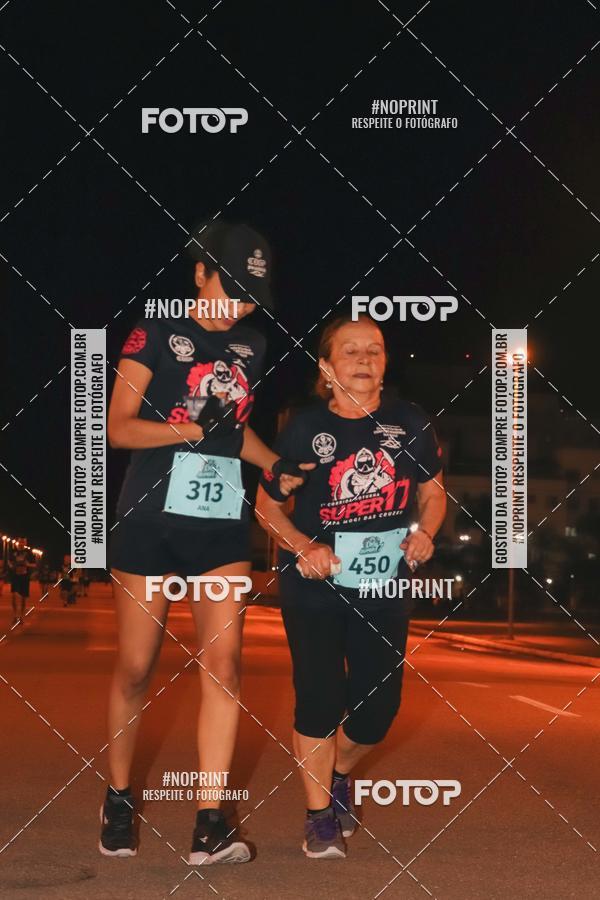 Buy your photos of the event1 Corrida Noturna Super 17 - Etapa Mogi das Cruzes on Fotop