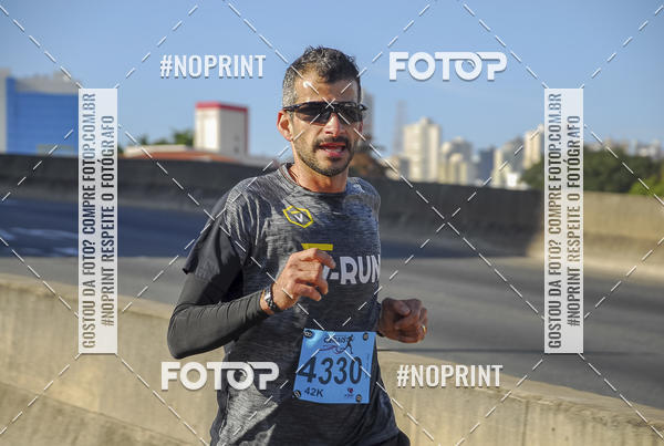 Buy your photos of the eventMaratona e Meia Maratona das Gerais on Fotop