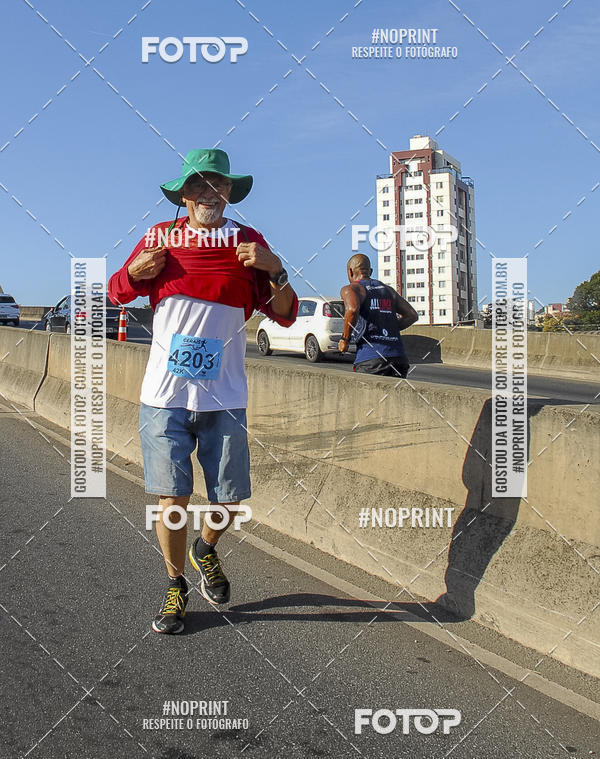 Buy your photos of the eventMaratona e Meia Maratona das Gerais on Fotop