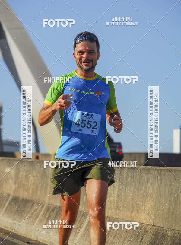 Buy your photos of the eventMaratona e Meia Maratona das Gerais on Fotop