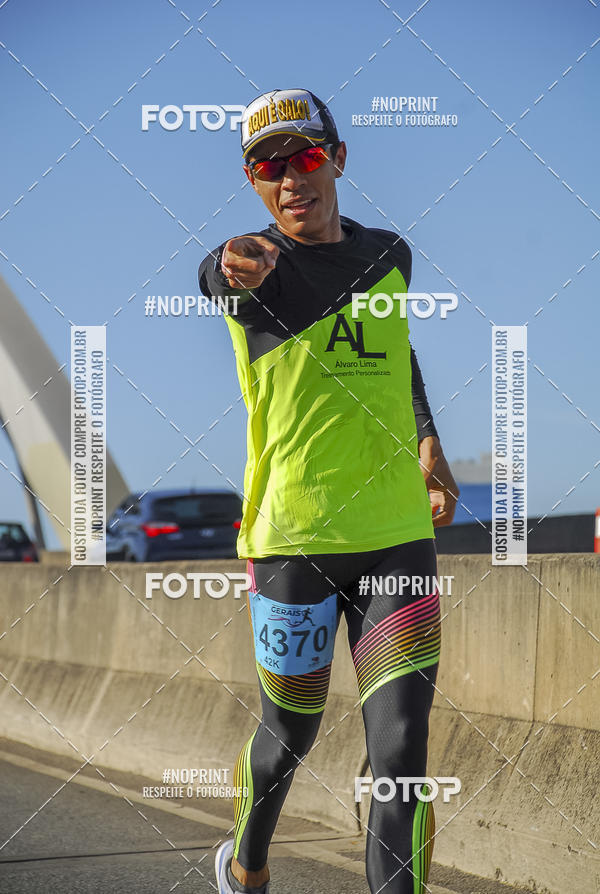 Buy your photos of the eventMaratona e Meia Maratona das Gerais on Fotop
