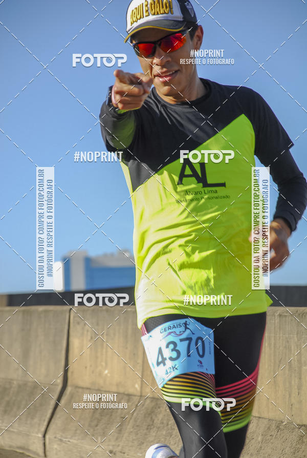 Buy your photos of the eventMaratona e Meia Maratona das Gerais on Fotop