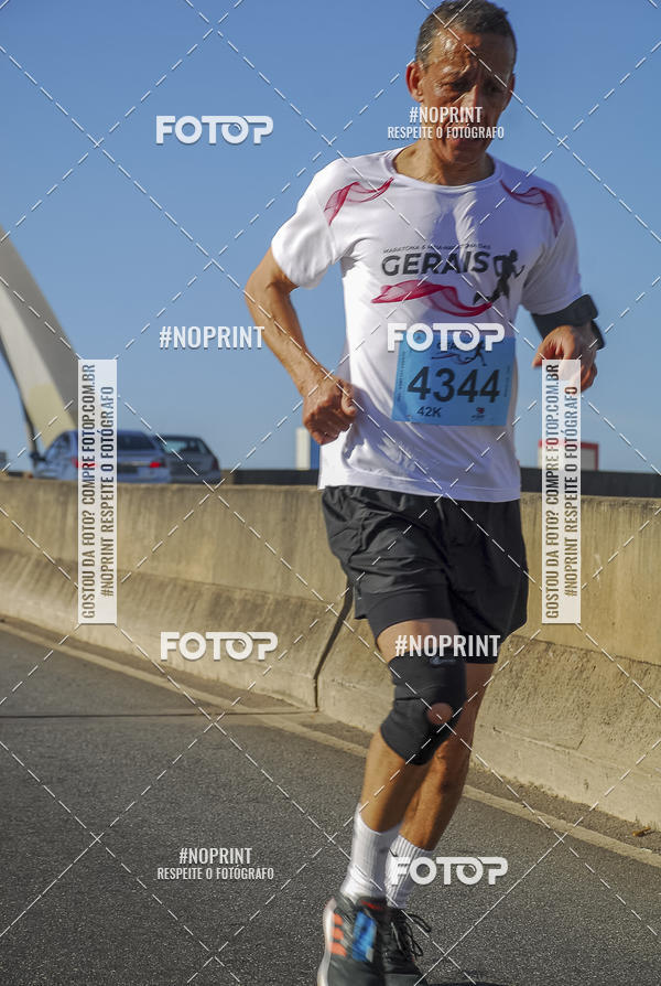 Buy your photos of the eventMaratona e Meia Maratona das Gerais on Fotop