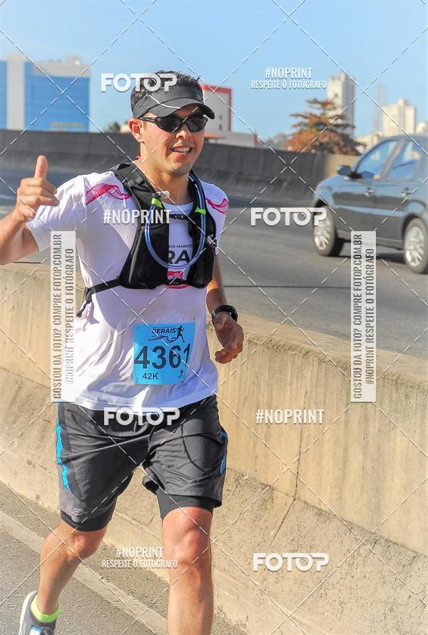 Buy your photos of the eventMaratona e Meia Maratona das Gerais on Fotop