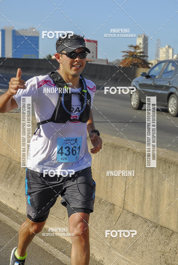 Buy your photos of the eventMaratona e Meia Maratona das Gerais on Fotop