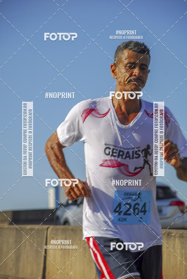 Buy your photos of the eventMaratona e Meia Maratona das Gerais on Fotop