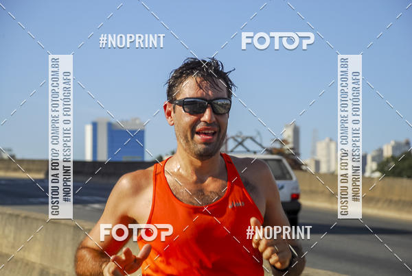 Buy your photos of the eventMaratona e Meia Maratona das Gerais on Fotop