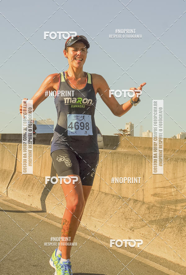 Buy your photos of the eventMaratona e Meia Maratona das Gerais on Fotop