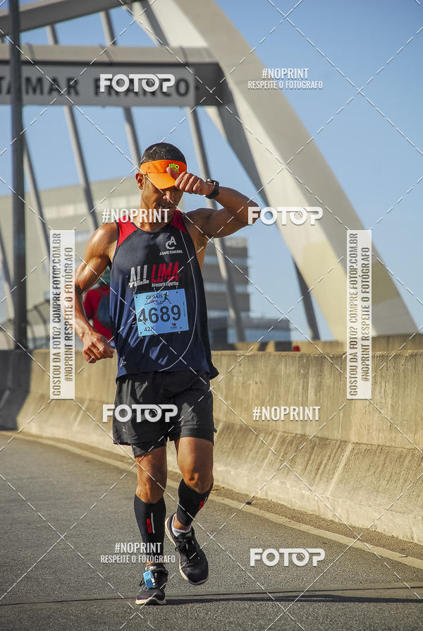 Buy your photos of the eventMaratona e Meia Maratona das Gerais on Fotop