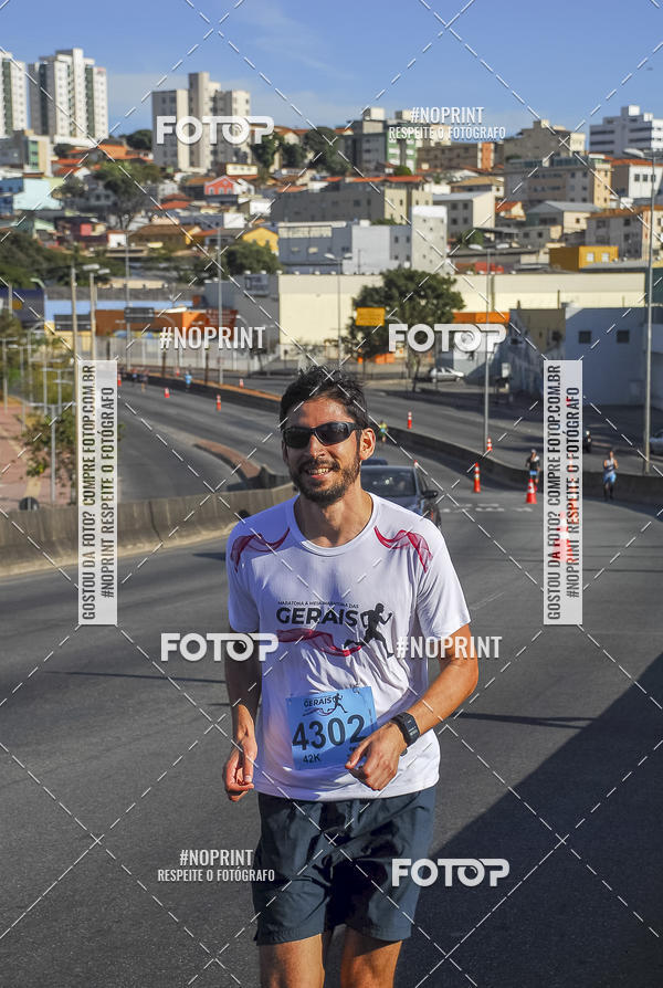 Buy your photos of the eventMaratona e Meia Maratona das Gerais on Fotop