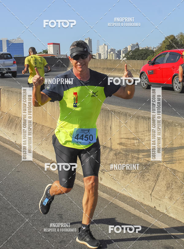 Buy your photos of the eventMaratona e Meia Maratona das Gerais on Fotop
