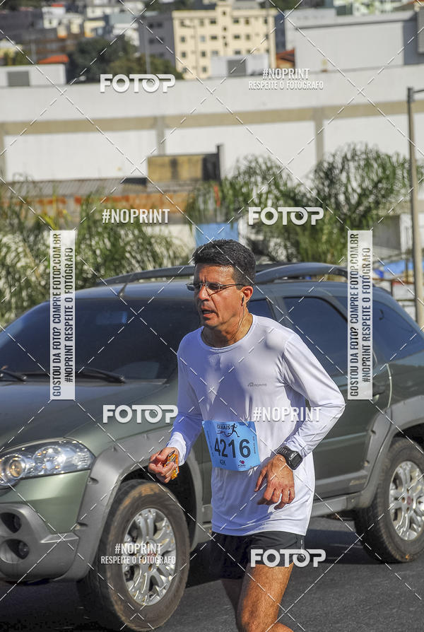 Buy your photos of the eventMaratona e Meia Maratona das Gerais on Fotop