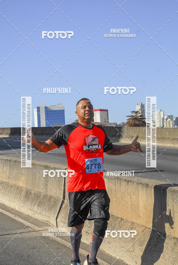 Buy your photos of the eventMaratona e Meia Maratona das Gerais on Fotop